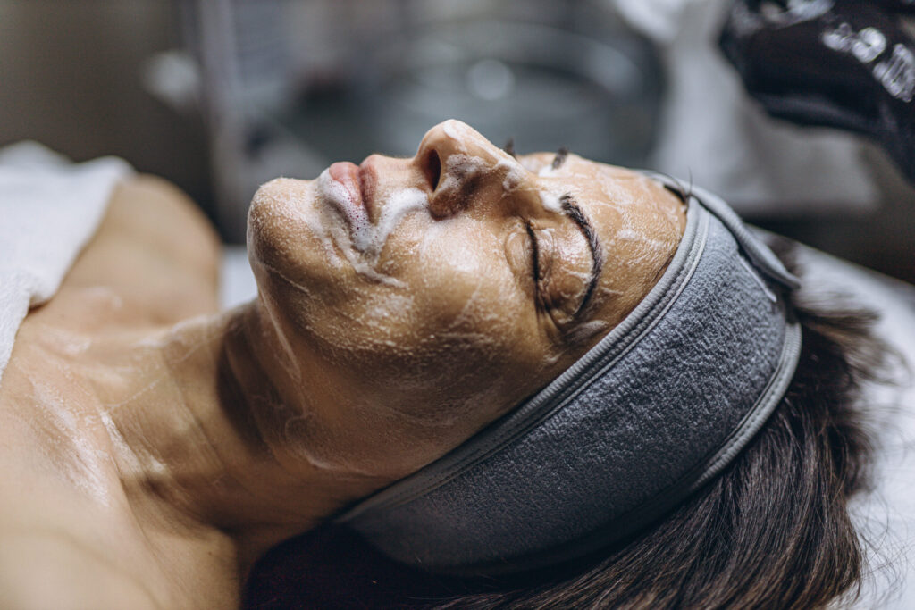 Relaxation at Just Breathe by Jodi in Cave Creek, AZ—a woman enjoys spa therapy facial mask for wellness and stress relief.